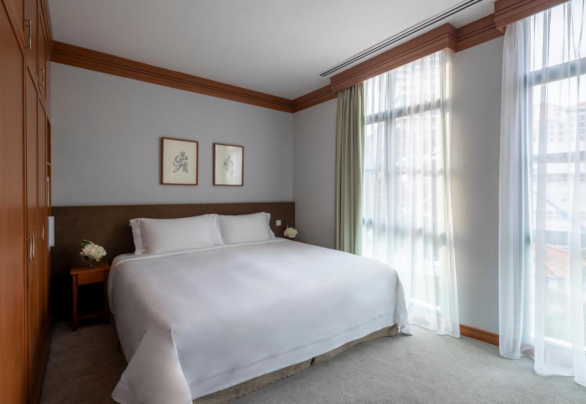 Fraser Place Robertson Walk Singapur Exterior foto A bedroom at The Hari