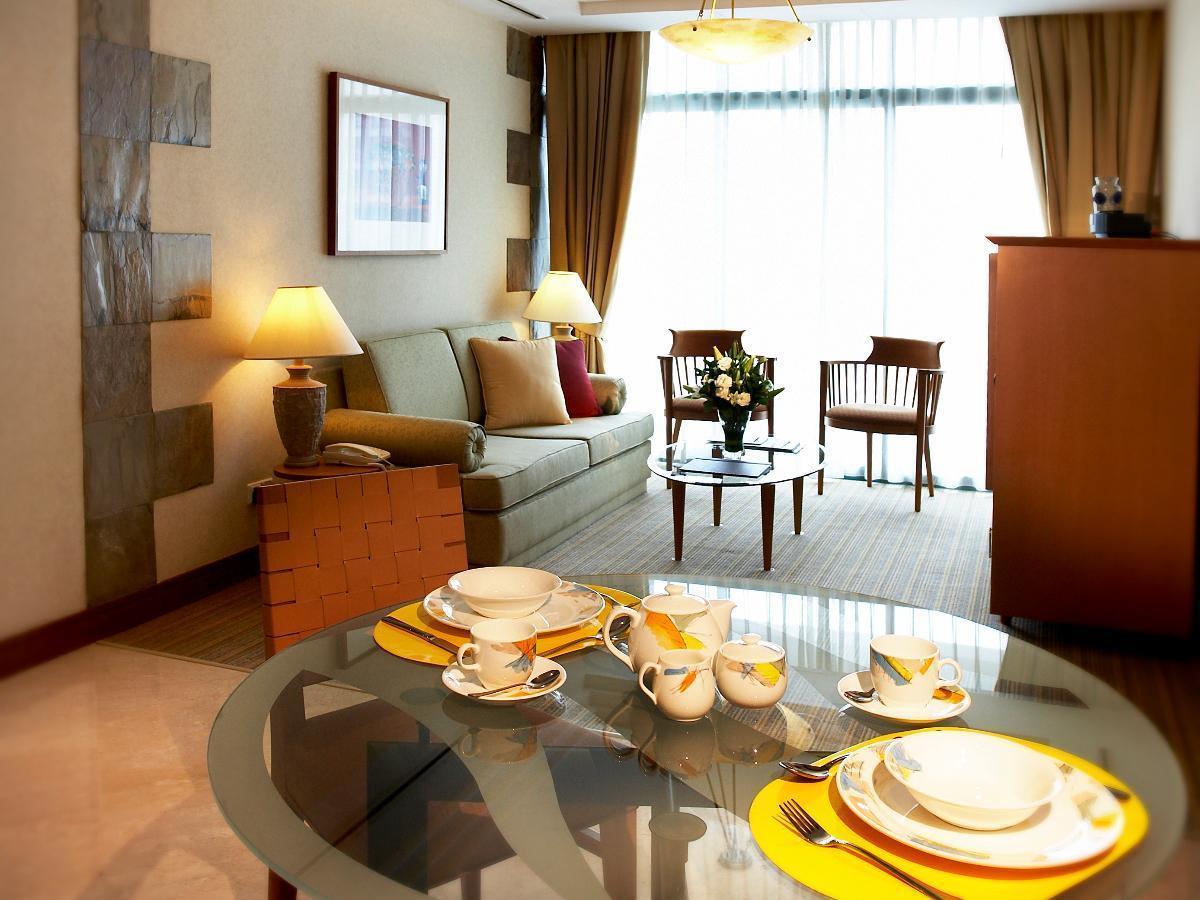 Fraser Place Robertson Walk Singapur Exterior foto A typical living room in a serviced apartment